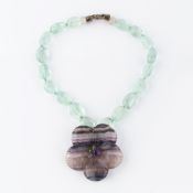 An aquamarine and fluorite necklace