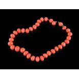 ϒ A coral bead necklace