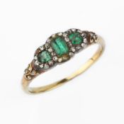 An antique emerald and diamond ring