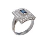 A sapphire and diamond panel ring