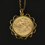 A half Sovereign pendant