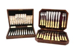 ϒ Two late Victorian wooden cased sets of cutlery