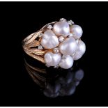 A diamond and baroque cultured pearl dress ring