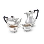 A matched silver four piece tea service by William Hutton & Sons