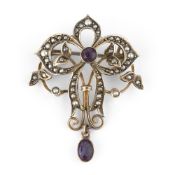 An Edwardian seed pearl and amethyst brooch