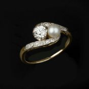 A diamond and pearl crossover ring
