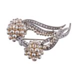 A cultured pearl and diamond brooch