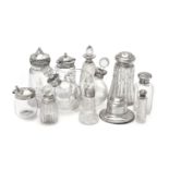 A collection of silver mounted clear and cut glass items