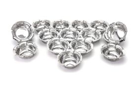 A set of sixteen Edwardian silver finger bowls by Atkin Bros