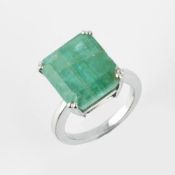 A single stone emerald dress ring