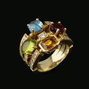 A multi gem set dress ring