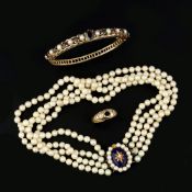 A garnet and cultured pearl bangle