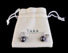 A pair of Tahitian cultured pearl and diamond earrings