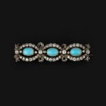 A turquoise and diamond brooch