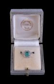 A 1930s platinum emerald and diamond ring