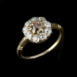 A brown diamond and diamond ring
