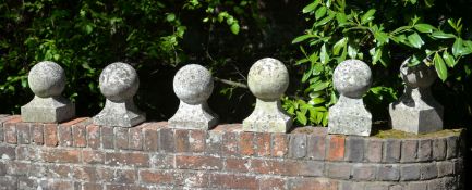 A set of six cut limestone, probably York stone finials,