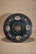 An Italian micro-mosaic inset black marble circular table top