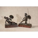 A pair of Continental, probably Italian bronze models of warriors in Grecian style,