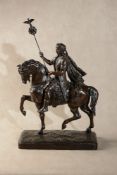 A patinated spelter equestrian group of a Roman emperor
