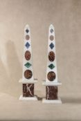 A pair of sample marble and hardstone inset white marble obelisks in Grand Tour style