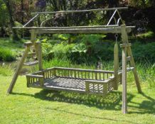 A hardwood garden swing divan