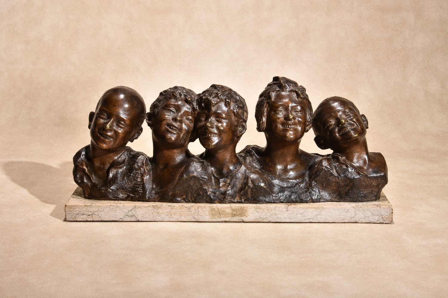 Vincenzo Aurisicchio, (Italian, 1855 - 1926), five adjoined busts of Neapolitan street urchins,