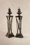 A pair of patinated bronze and marble mounted models of tripod atheniennes