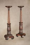 A pair of substantial George IV or William IV mahogany torchere stands,