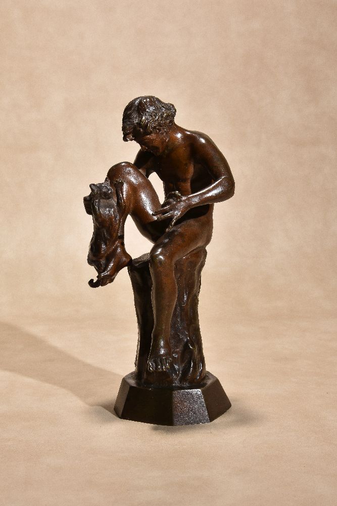 Vincenzo Alfano, (Italian, ca. 1854 - 1897), a patinated bronze model of a boy with a cat and a mous