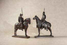 After Emmanuel Frémiet, (French 1824 - 1910), a pair of patinated bronze equestrian models, Le Chef