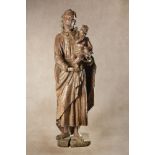 A sculpted oak group of Saint Joseph with the Infant Christ