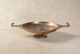 A Continental gilt and patinated bronze twin handled tazza in Neoclassical style