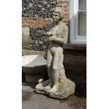 A sculpted stone, probably Purbeck model of Bacchus,