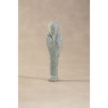 An Egyptian faience glazed earthenware ushabti figure