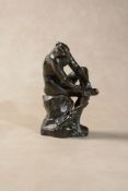 Aimé-Jules Dalou, (French 1838 - 1902), Baigneuse s’essuyant le pied, a patinated bronze model of a