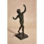 An Italian patinated bronze model of the Pompeiian Dancing Faun