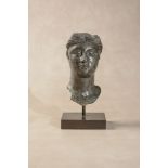 A Roman bronze bust of a woman