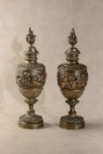 A pair of Continental gilt bronze models of urns in Neoclassical taste