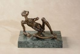 λ Sean Rice, (1931 - 1997), Untitled, a stylised bronze model of a reclining male nude