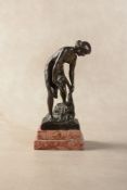 λ Edmund Korosadowicz, (Polish 1872 - 1964), a patinated bronze and marble mounted model of a nude