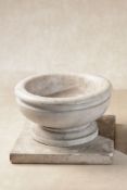 A white marble basin or urn,