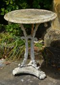 A Victorian white painted cast iron garden table,