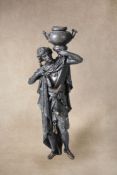 A Continental patinated spelter model of a Levantine gentleman