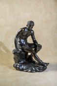 A Continental patinated bronze model of Mercury Resting