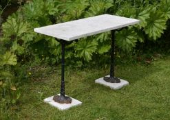 A black painted cast iron and striated white marble conservatory or garden table