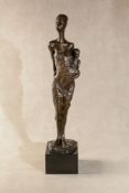 20 Century School, a patinated bronze figural group of a mother and child,