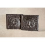 A pair of relief carved oak Romayne panels
