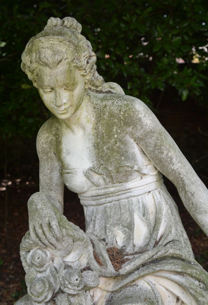 A stone composition garden model of a maiden probably emblematic of Summer, - Image 2 of 4