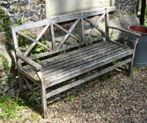 A teak garden seat,